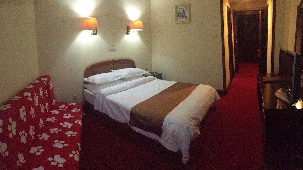 Gan Jin Hotel Tientsin Oda fotoğraf