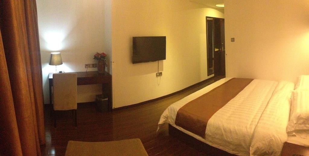 Gan Jin Hotel Tientsin Oda fotoğraf