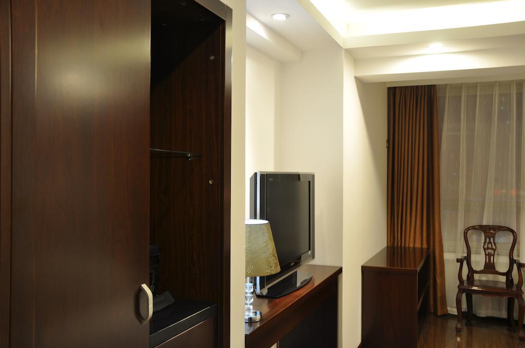 Gan Jin Hotel Tientsin Oda fotoğraf