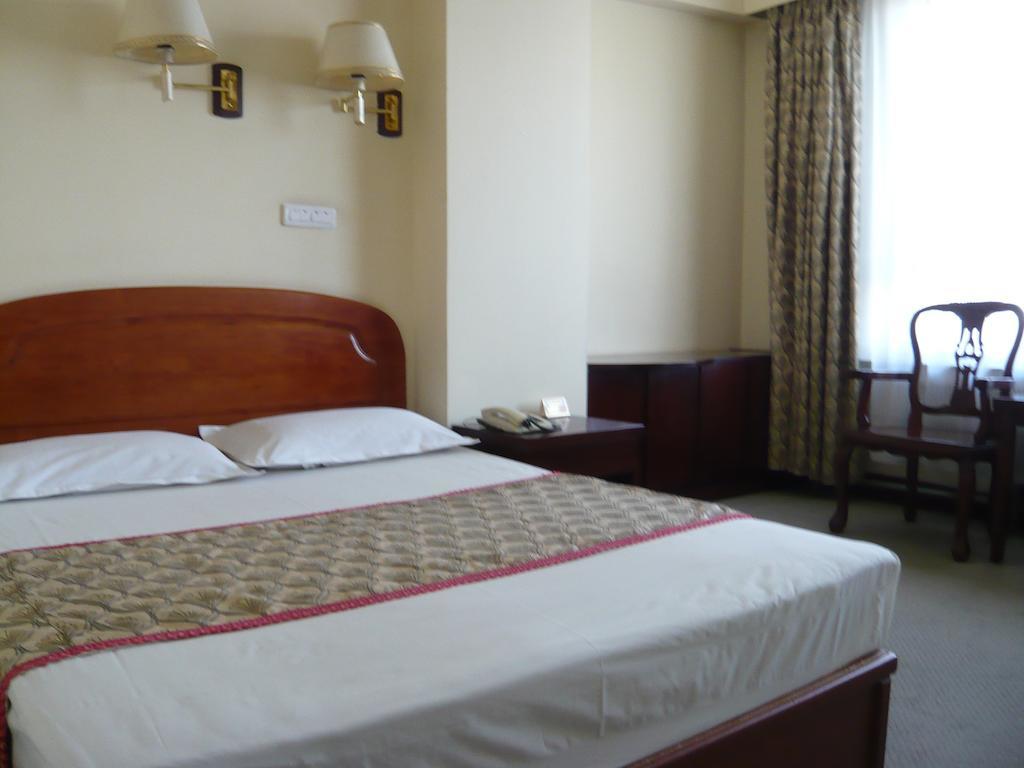 Gan Jin Hotel Tientsin Oda fotoğraf